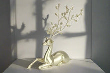 Load image into Gallery viewer, Festive champagne reindeer statue.