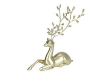 Load image into Gallery viewer, Sitting reindeer statue in a chic champagne finish.