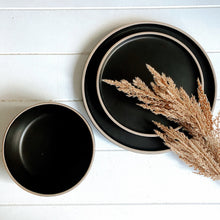 Load image into Gallery viewer, Ideal for everyday dining is Salt&Pepper's 12 piece HANA dinner set in black, offers a simple yet modern shape with a slight speckle tone throughout and is finished with a natural-coloured rim. Shop online. AfterPay available. Australia wide Shipping | Bliss Gifts & Homewares - Unit 8, 259 Princes Hwy Ulladulla - 0427795959, 44541523