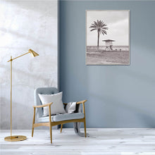 Load image into Gallery viewer, Transform your space with the calming coastal vibes of our Life Guard Framed Canvas. This gorgeous relaxed and neutral piece will bring style to any space and is an easy way to update your home decor. Finished with a natural timber look frame. 80 x 100cm. | Bliss Gifts & Homewares | Unit 8, 259 Princes Hwy Ulladulla | South Coast NSW | Online Retail Gift & Homeware Shopping | 0427795959, 44541523