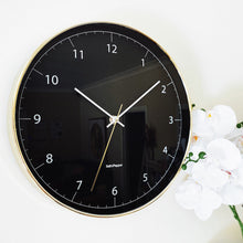 Load image into Gallery viewer, Stay ahead of time and style any wall space with this classic 31cm BLAIR wall clock from Salt&Pepper's MOOD collection. Black face, gold frame. Easy-to-read numbers and dials. Silent sweep movement. Shop online or instore. AfterPay available. Australia wide Shipping. | Bliss Gifts & Homewares | Unit 8, 259 Princes Hwy Ulladulla | South Coast NSW | 0427795959, 44541523