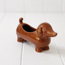 Load image into Gallery viewer, Liven up your home with our fun Dachshund Puppy Pot. Perfect for your favourite windowsill flower, or would make a fun and quirky way to store things. 16 x 5 x 8cm. BLISS Gifts & Homewares - Online & In-store. AfterPay now available | Bliss Gifts & Homewares - Unit 8, 259 Princes Hwy Ulladulla - 0427795959, 44541523