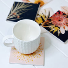 Load image into Gallery viewer, Our Flourish Ceramic Coaster - Pink Flower is inspired by the beauty of nature. The Flourish Homewares Range features budding blossoms, wild flowers, and soft, natural textures that tie beautifully into any home.| Bliss Gifts & Homewares | Unit 8, 259 Princes Hwy Ulladulla | South Coast NSW | Online Retail Gift & Homeware Shopping | 0427795959, 44541523