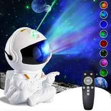 Load image into Gallery viewer, Cosmic astronaut night light and star projector