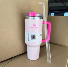 Load image into Gallery viewer, Stanley Quencher H2.0 40oz Flow State Tumbler in vibrant Flamingo Pink.