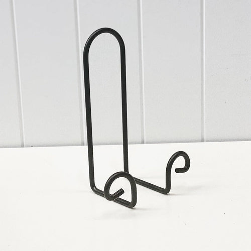 Display your favourite cook books, books and plates with our sturdy black metal Book or Plate Display Stand - Small. Perfect for making your favourite plates a statement piece in your home or keeping your faviourite recipe handy while cooking. Size: 15x21cm. Shop online. AfterPay available. Australia wide Shipping | Bliss Gifts & Homewares - Unit 8, 259 Princes Hwy Ulladulla - 0427795959, 44541523
