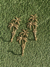 Load image into Gallery viewer, Our Islander Palm Tree Wall Hook has two brass swaying palm trees and a single hook. This little beauty is great to hang your keys, hat or towels. Our Islander Palm Tree Wall Hook comes with screws ready to hang. Add a touch of the tropics to your decor.| Bliss Gifts &amp; Homewares | Unit 8, 259 Princes Hwy Ulladulla | South Coast NSW | Online Retail Gift &amp; Homeware Shopping | 0427795959, 44541523