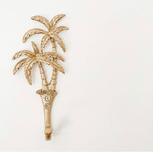 Load image into Gallery viewer, Our Islander Palm Tree Wall Hook has two brass swaying palm trees and a single hook. This little beauty is great to hang your keys, hat or towels. Our Islander Palm Tree Wall Hook comes with screws ready to hang. Add a touch of the tropics to your decor.| Bliss Gifts &amp; Homewares | Unit 8, 259 Princes Hwy Ulladulla | South Coast NSW | Online Retail Gift &amp; Homeware Shopping | 0427795959, 44541523