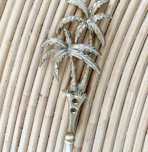 Load image into Gallery viewer, Our Islander Palm Tree Wall Hook has two brass swaying palm trees and a single hook. This little beauty is great to hang your keys, hat or towels. Our Islander Palm Tree Wall Hook comes with screws ready to hang. Add a touch of the tropics to your decor.| Bliss Gifts &amp; Homewares | Unit 8, 259 Princes Hwy Ulladulla | South Coast NSW | Online Retail Gift &amp; Homeware Shopping | 0427795959, 44541523