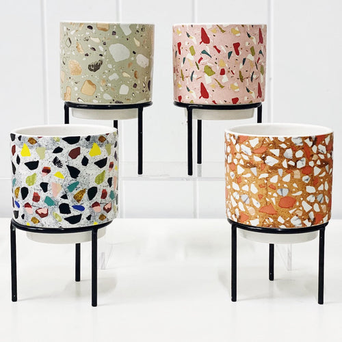 Showcase your favourite plants, succulents, and flowers with the beautiful and unique Terrazzo Pots on Stand in Small. Approx size: 10x10x10cm. Ceramic. Drainage hole and plug for your convenience.| Bliss Gifts & Homewares | Unit 8, 259 Princes Hwy Ulladulla | South Coast NSW | Online Retail Gift & Homeware Shopping | 0427795959, 44541523