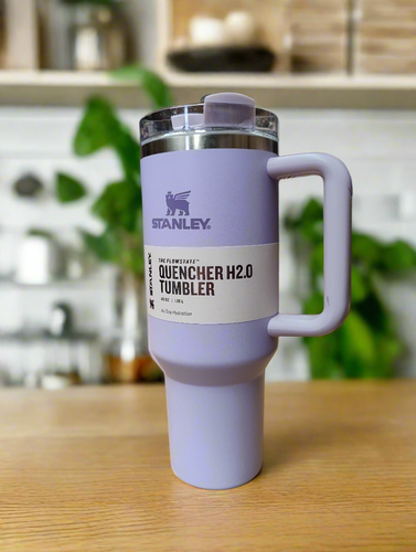 Stanley Quencher 40oz purple tumbler with straw.

