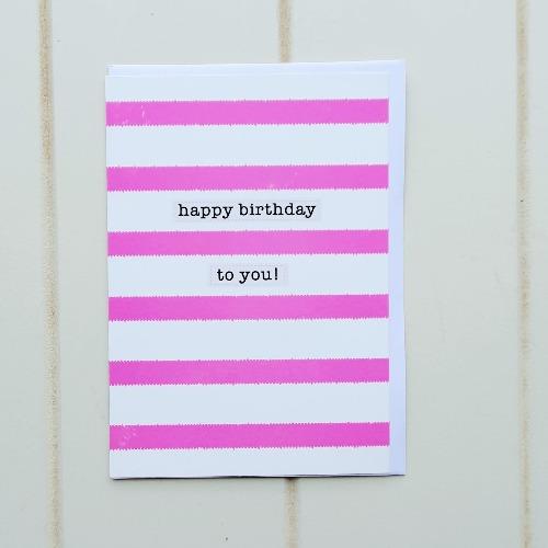 Happy Birthday Pink Stripes Greeting Card. Tall white and pink striped Happy Birthday card. Perfect for any birthday occasion, on the inside of the card it reads 